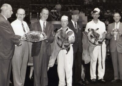 Ernest Redelmeier receives a trophy at the Royal Winter Fair